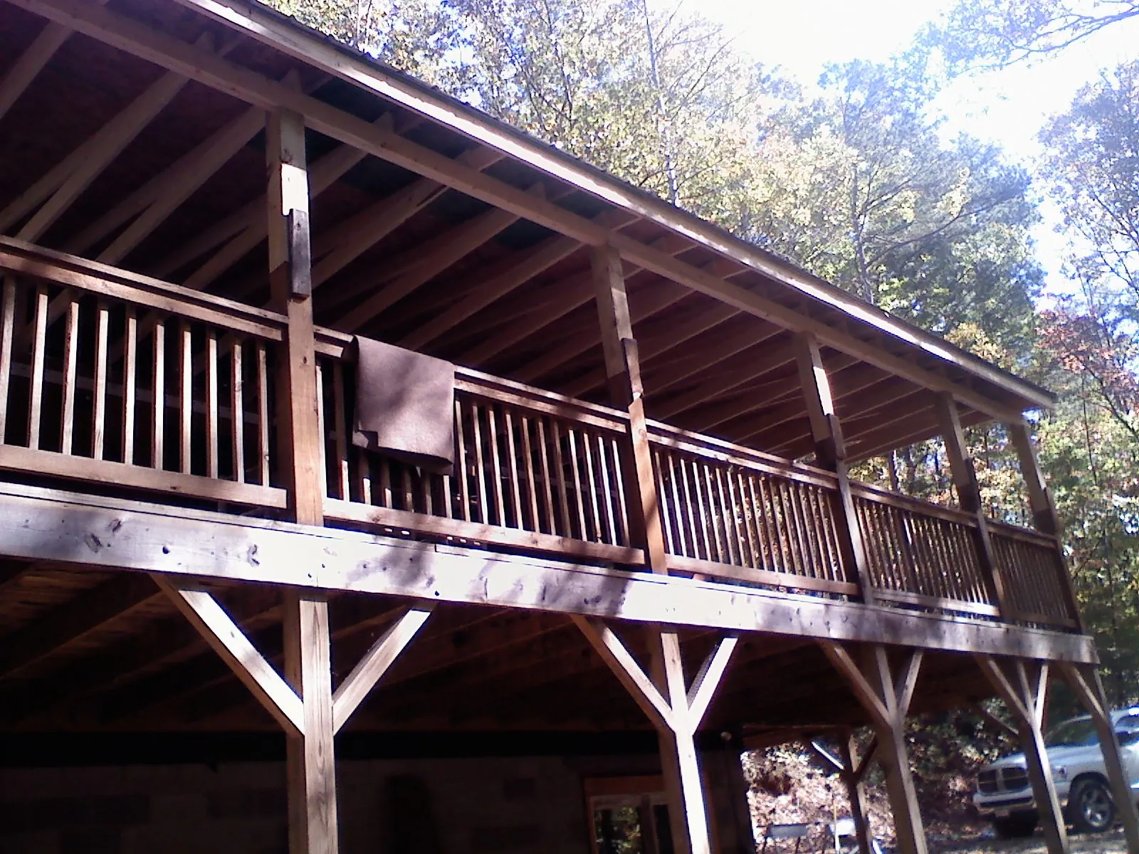 Timber framing under a new elevated porch and deck — Roof Leak Repair in Preble by Roofing Brothers